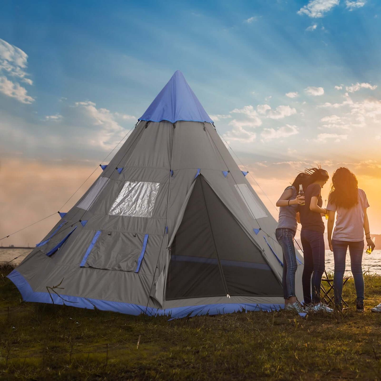 7-Person 12FT Camping Tent set up by friends at sunset, offering a spacious outdoor shelter for adventures.