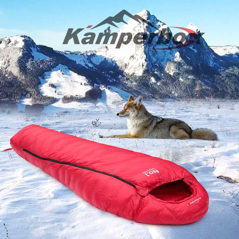 CW1100 Winter Sleeping Bag displayed in snowy landscape with a fox in the background.