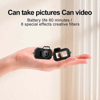 Key Chain Mini Camera With 32GB SD Card in hand demonstrating features and battery life.