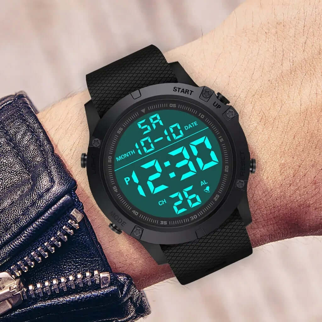 Tactical Military Digital Watch on wrist, displaying an illuminated digital face with time and date features.