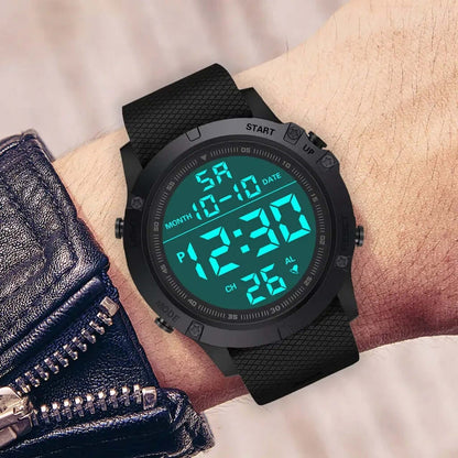 Tactical Military Digital Watch on wrist, displaying an illuminated digital face with time and date features.